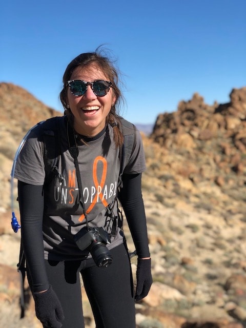 Girl laughing with MS shirt on