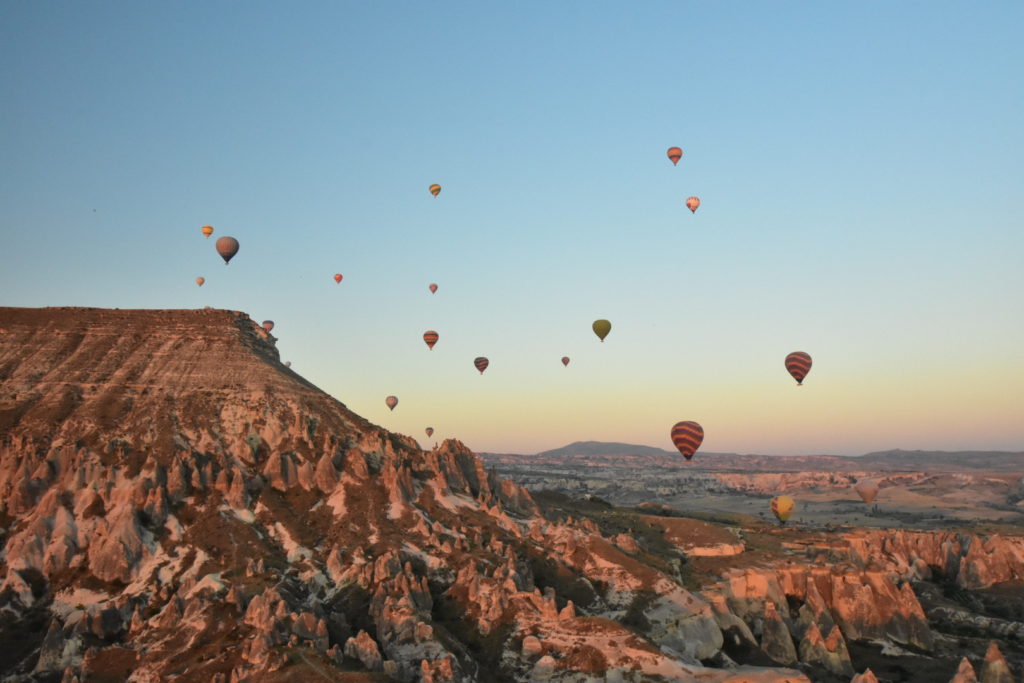 sunrise sky with mountain and hot air balloons