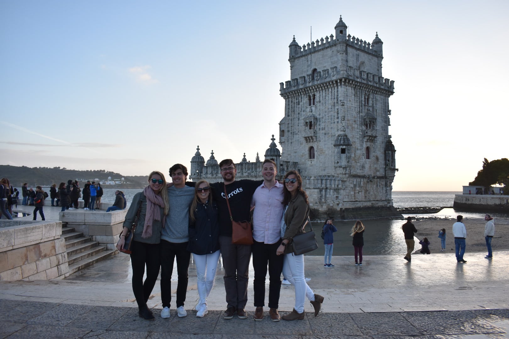 group of people in front of belem tower