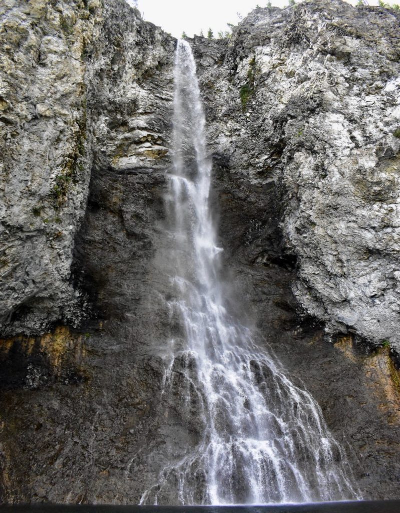 fairy falls coming off cliff