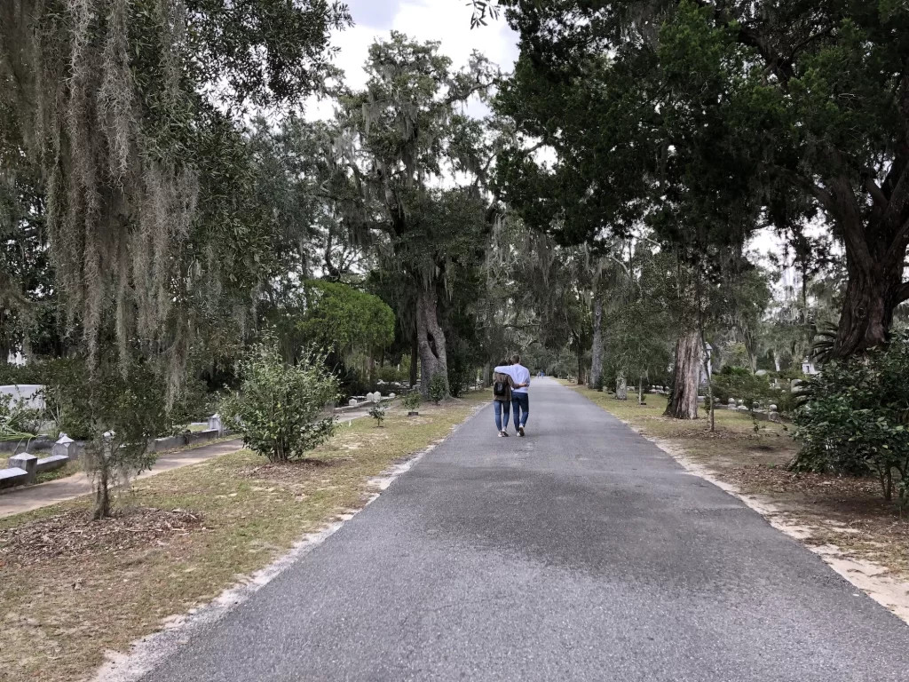 People walking down the paths of Bonaventure cemetery