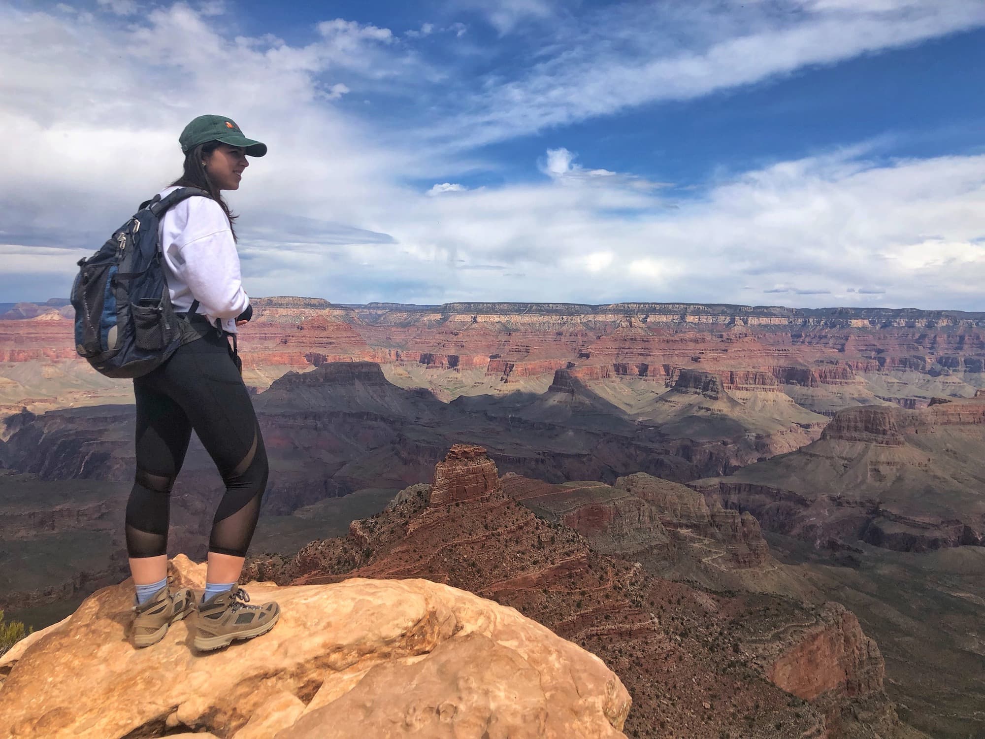 Girl looking out over the Grand Canyon