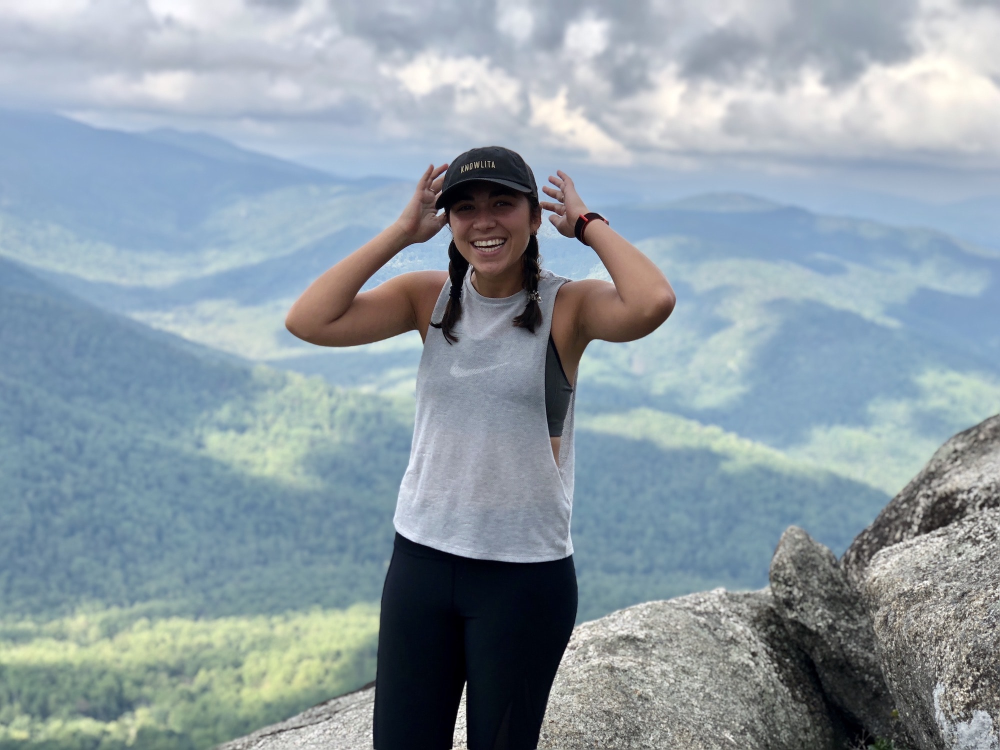 Girl standing on the top of Old Rag