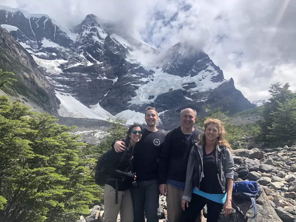 family in front of french valley glacier