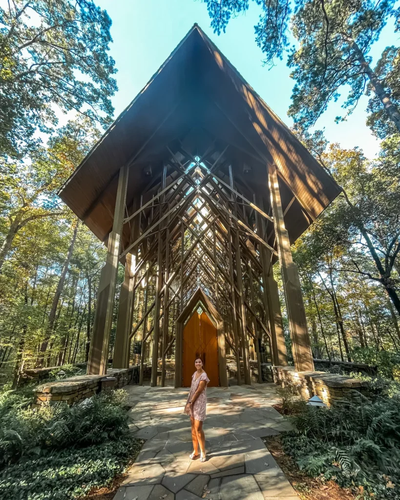 Girl standing in front of Thorncrown Chapel