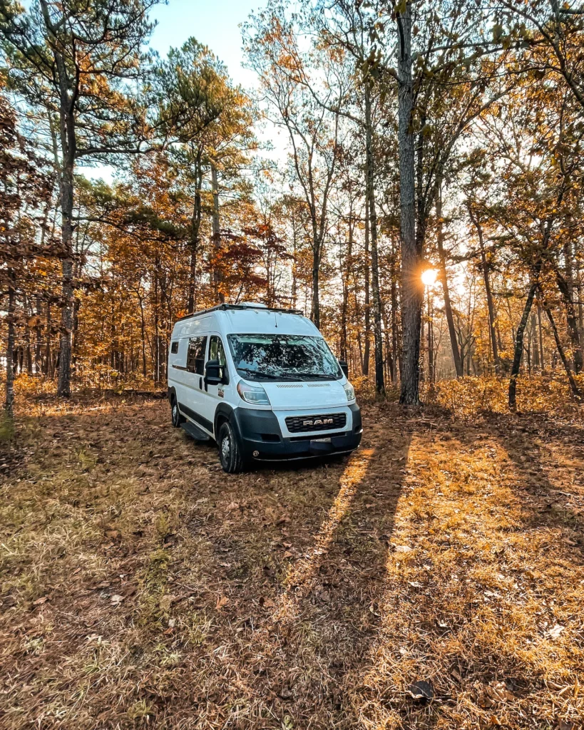 Van in the middle of the fall foliage