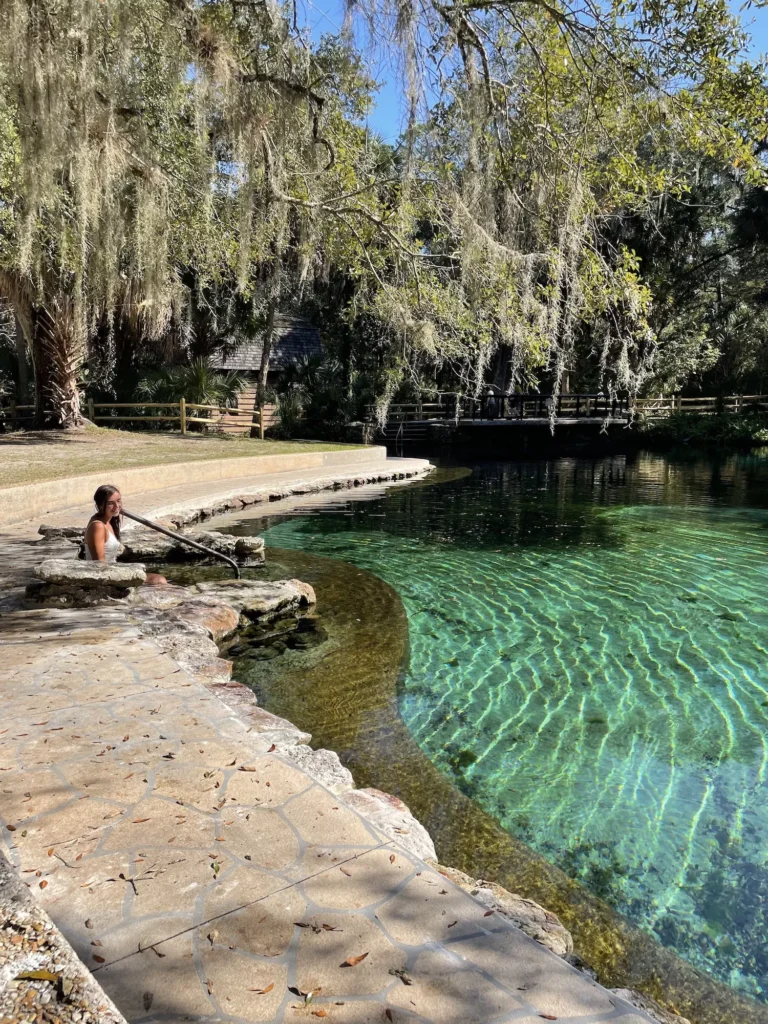 woman sitting at Juniper Springs