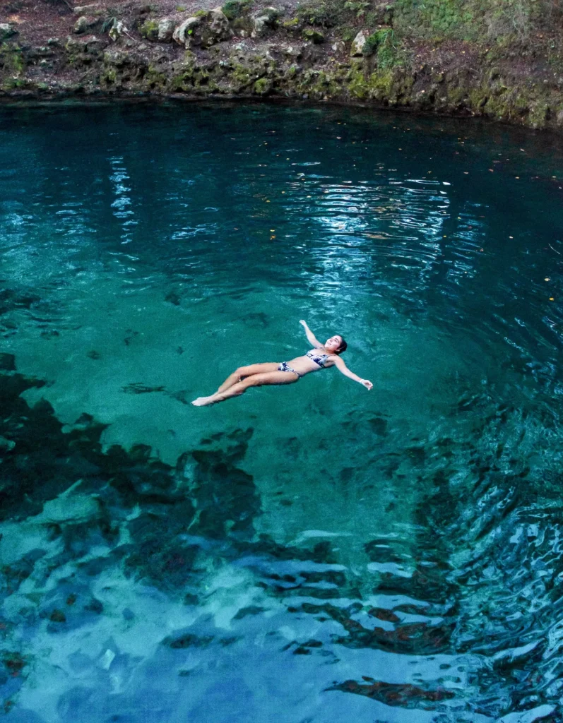 girl floating in Madison Blue Springs