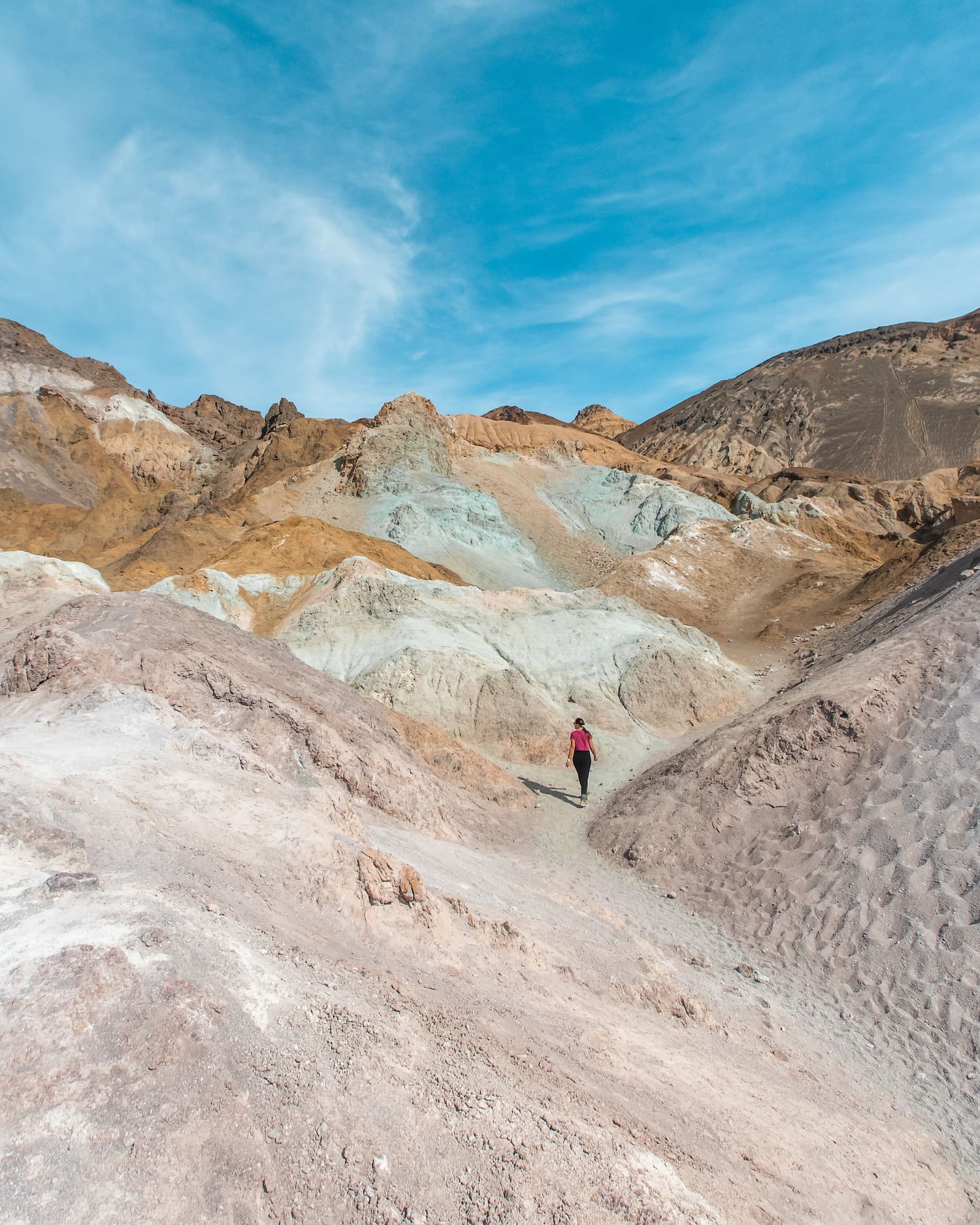 Picture of a girl walking through colorful canyon (artist's palette)
