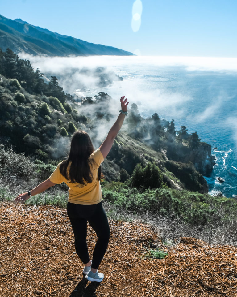 pacific coast highway road trip cover; me standing in front of coastline