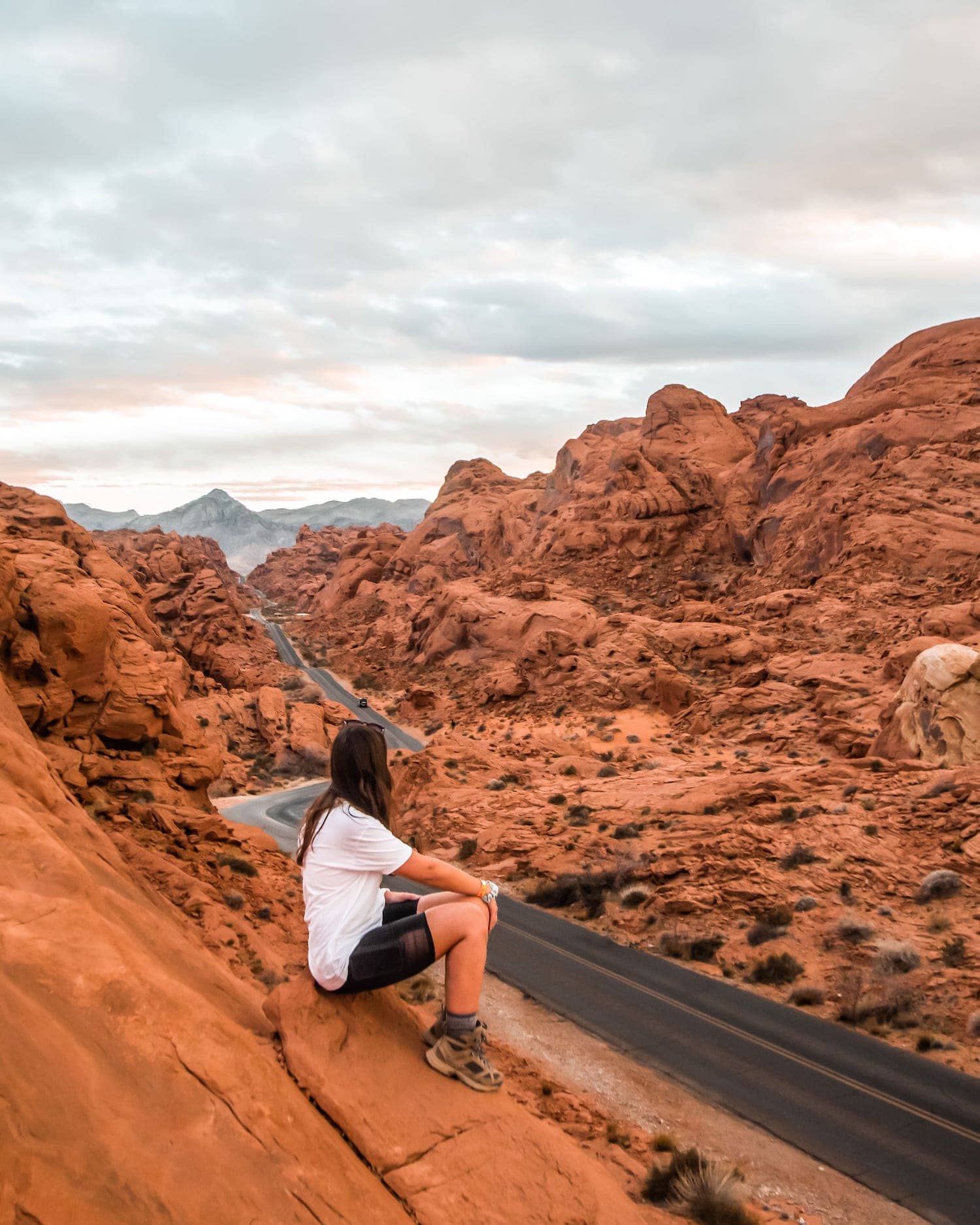 Me sitting on mountainside looking over the Valley of Fire