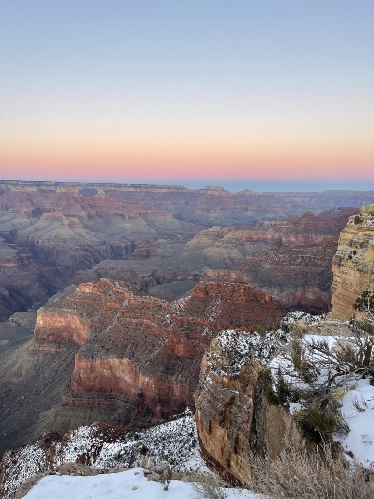 sunset with pinks in sky over grand canyon