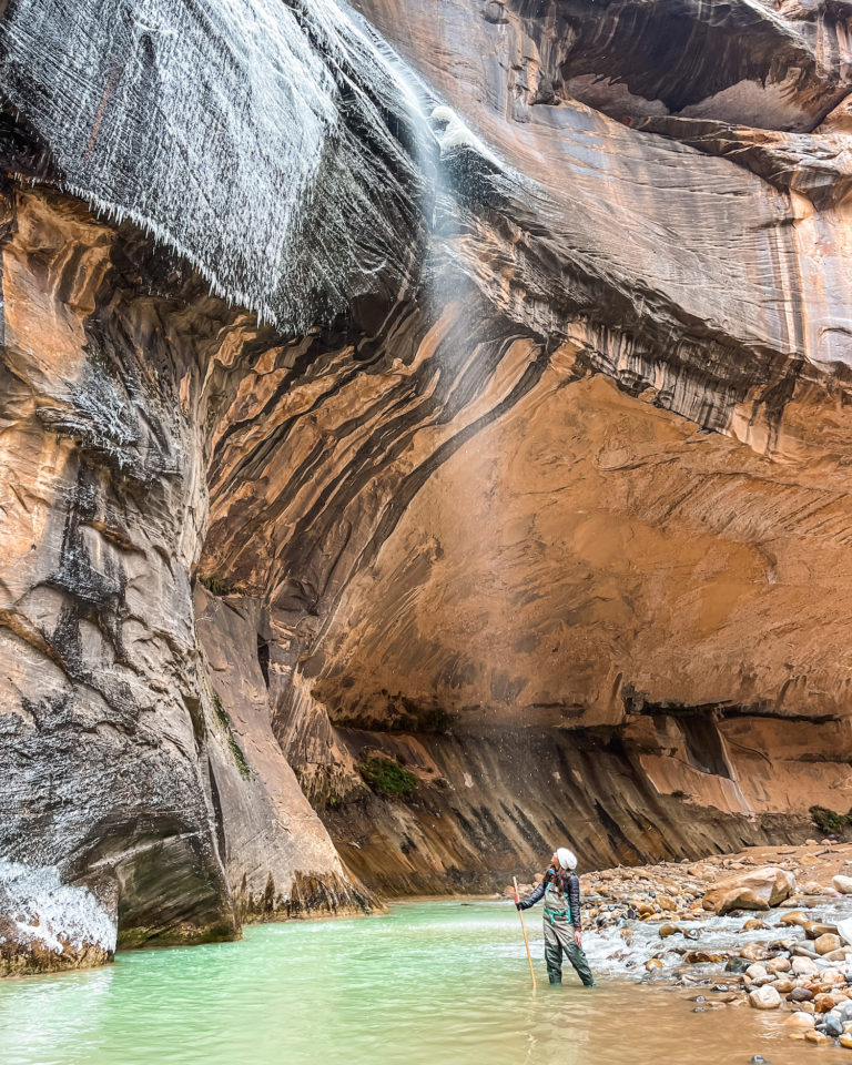 Me Looking Up at Waterfall in the river; hiking the narrows cover