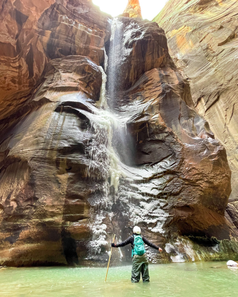 I am standing in front of frozen waterfalls in the narrows; kanab to zion