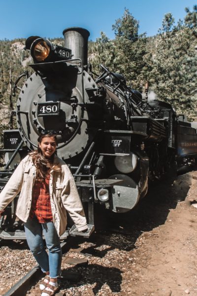 Me standing in front of the train