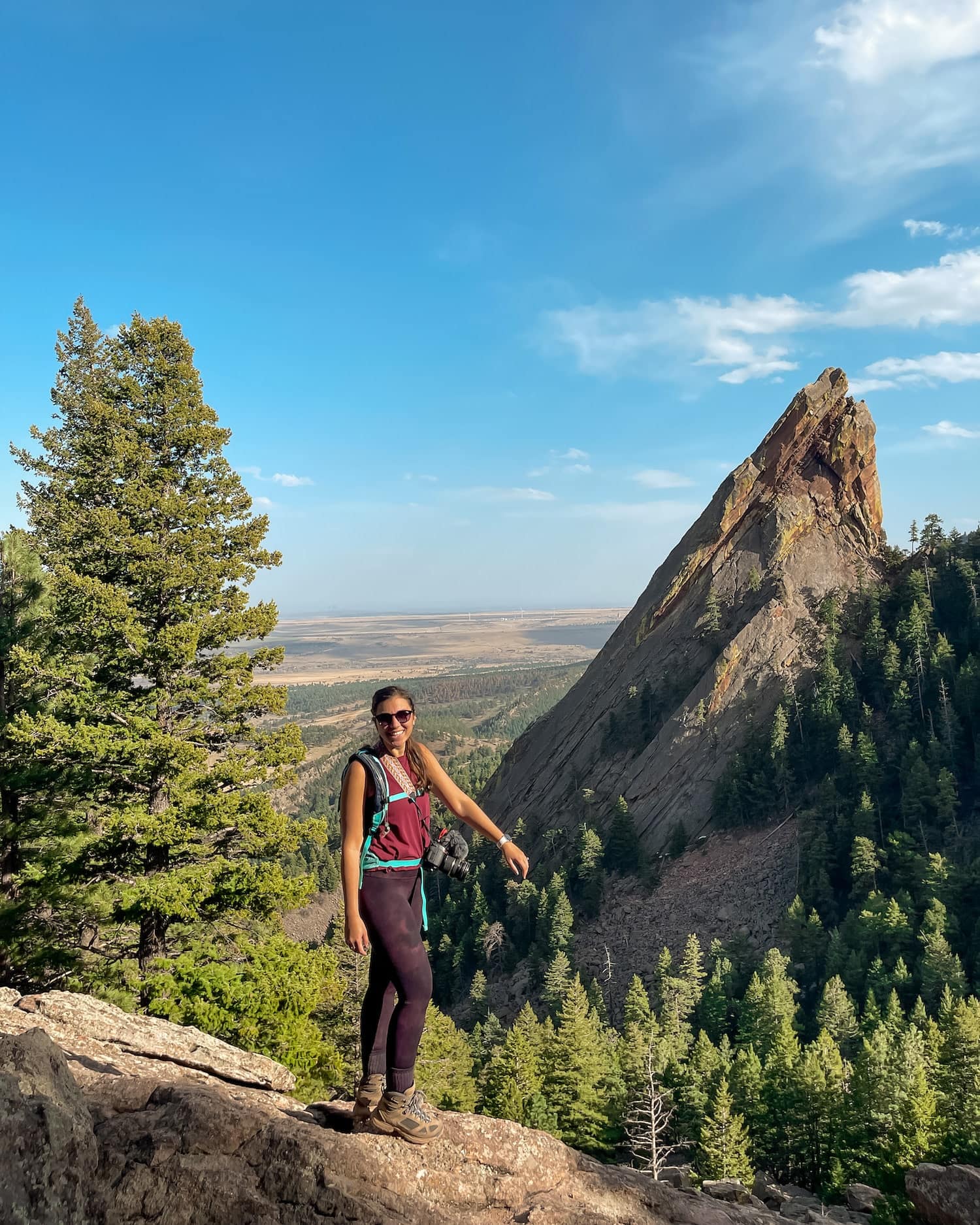 girl with flatirons behind her