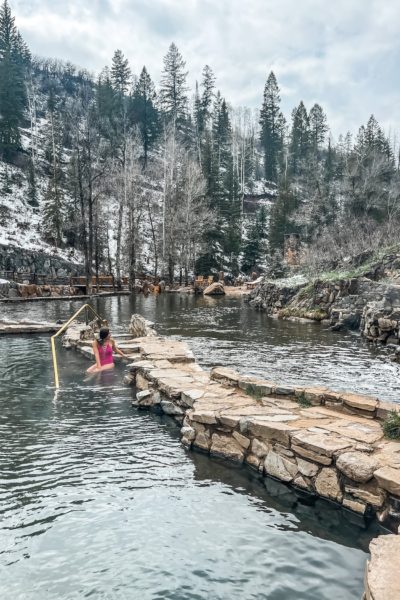 Girl soaking in strawberry hot springs