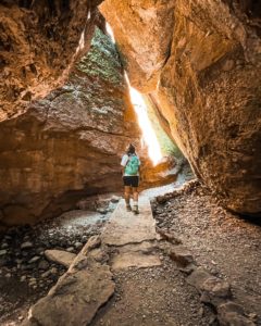 girl walking in bear gulch cave