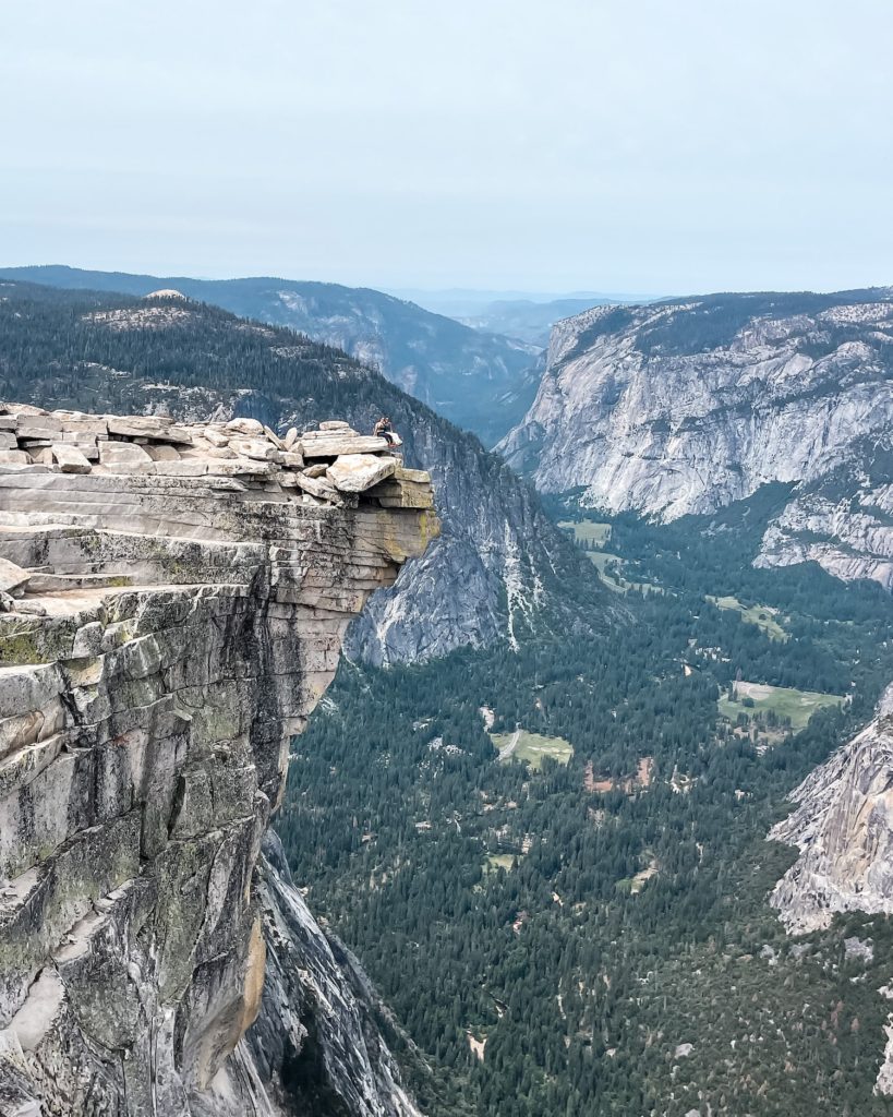 girl on diving board at half dome