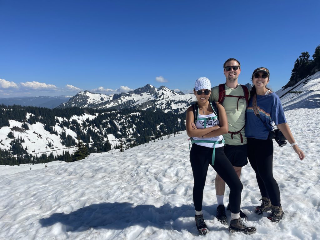 three people at rainier