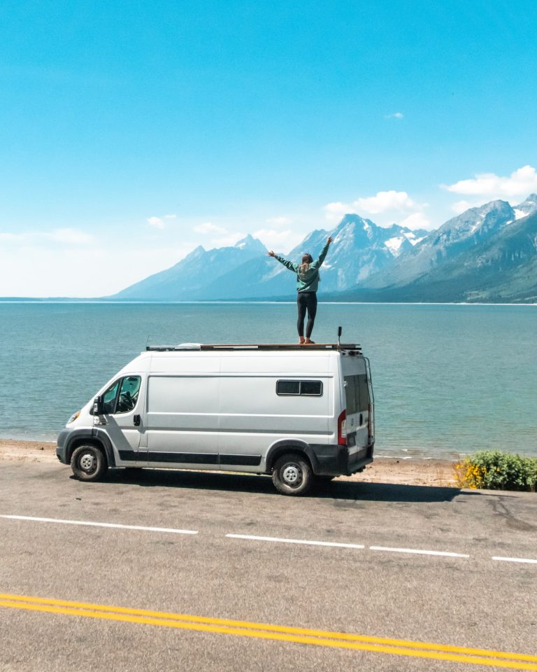 girl standing on van