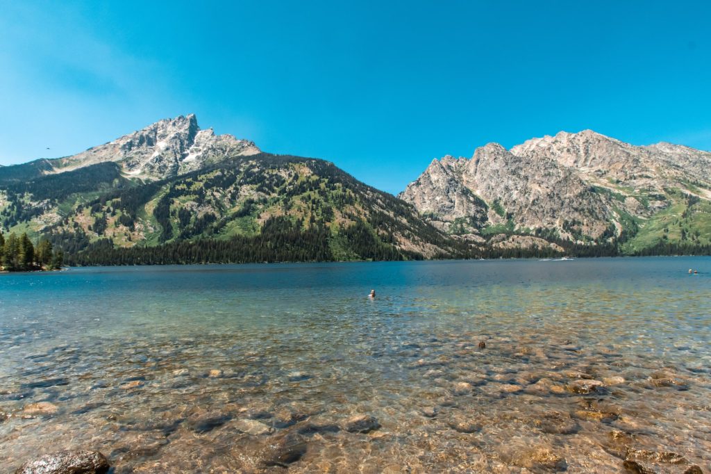 person in Jenny Lake grand tetons