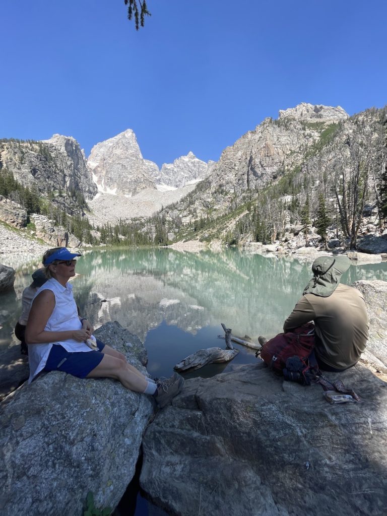 people eating lunch by delta lake