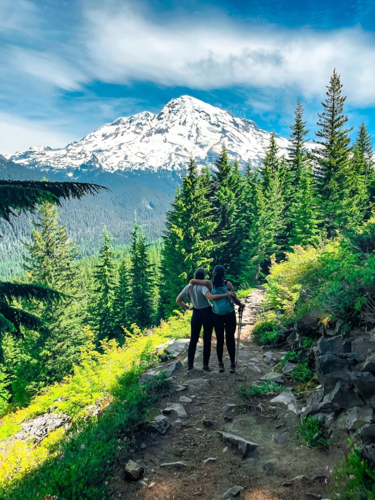 two people in front of rainier