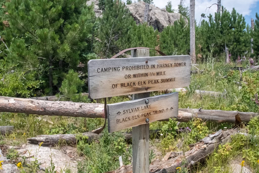 sign to reach the trail for black elk peak and sylvan lake