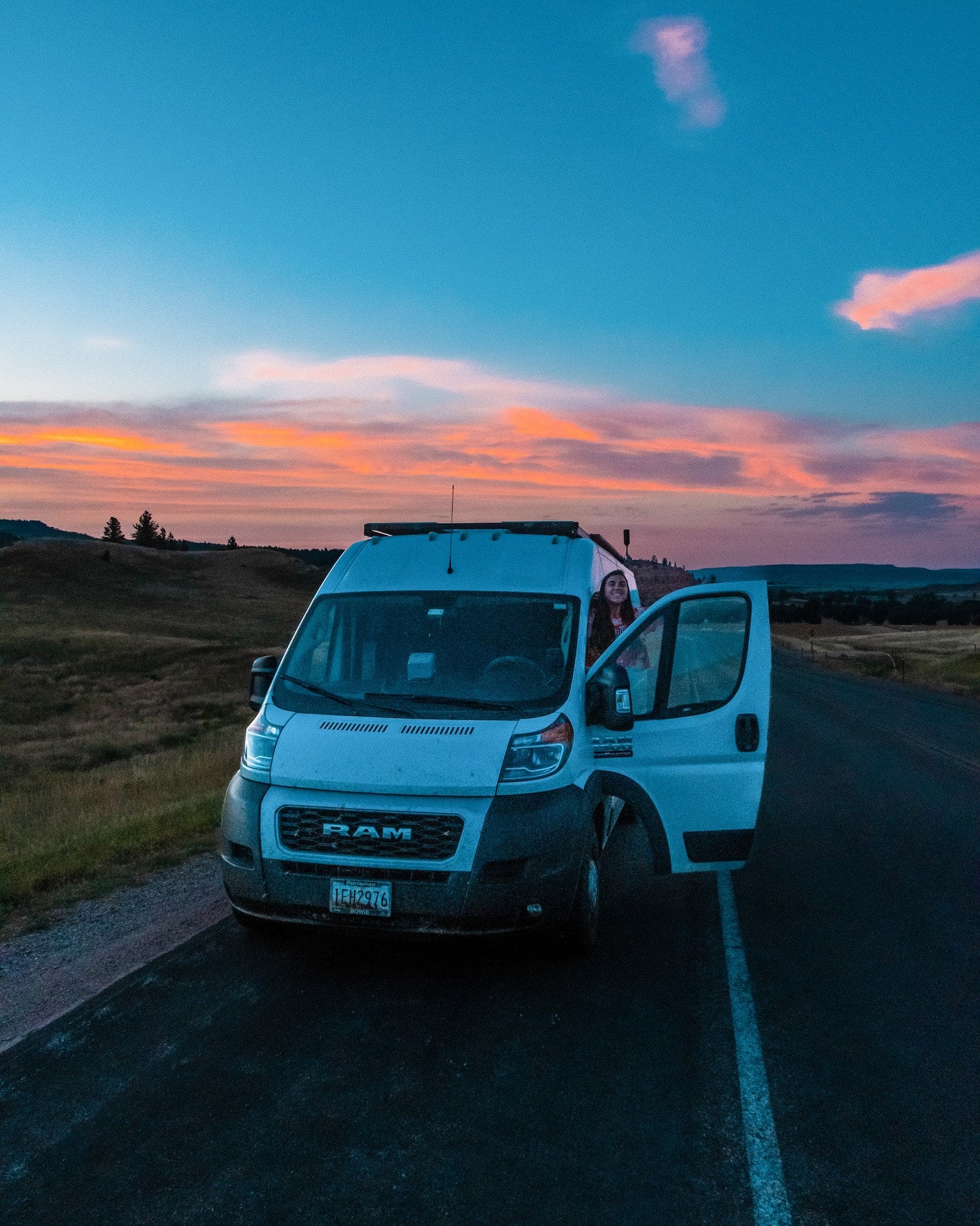 girl in van at devils tower