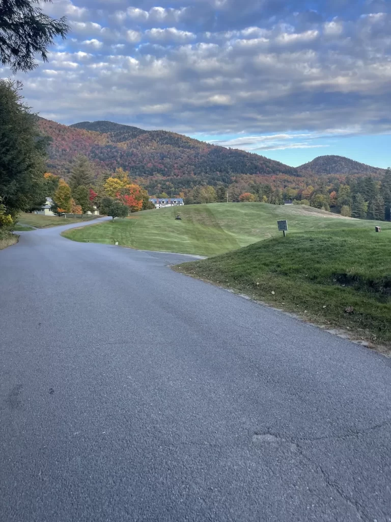 golf course in the adirondacks with fall colors