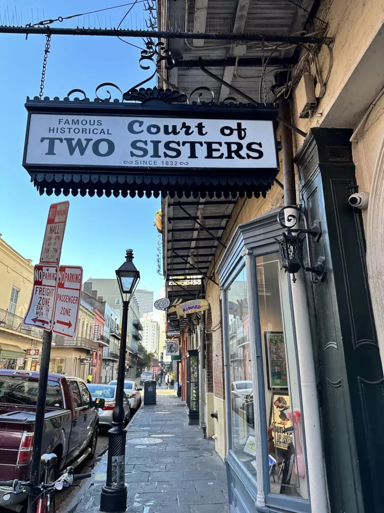 Sign for the Court of Two Sisters