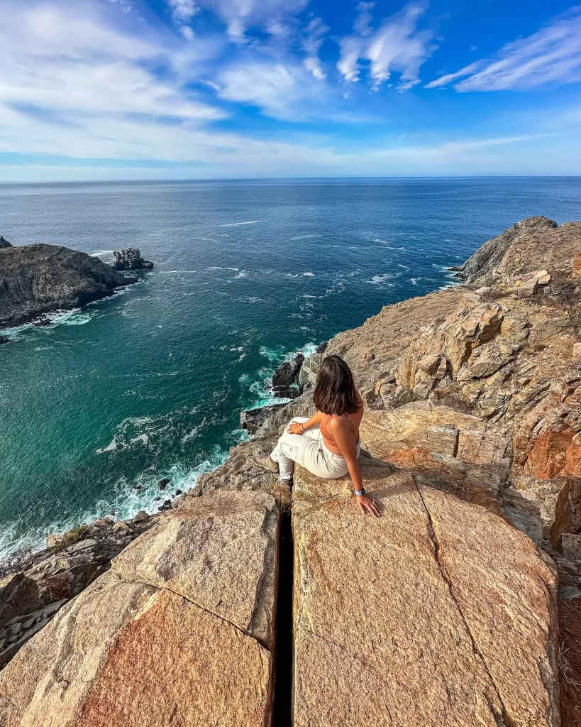 girl on the top of punta lobos hike