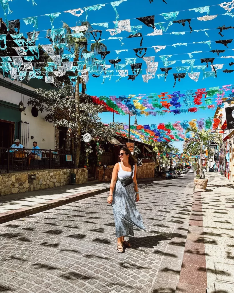 girl walking streets of san jose del cabo