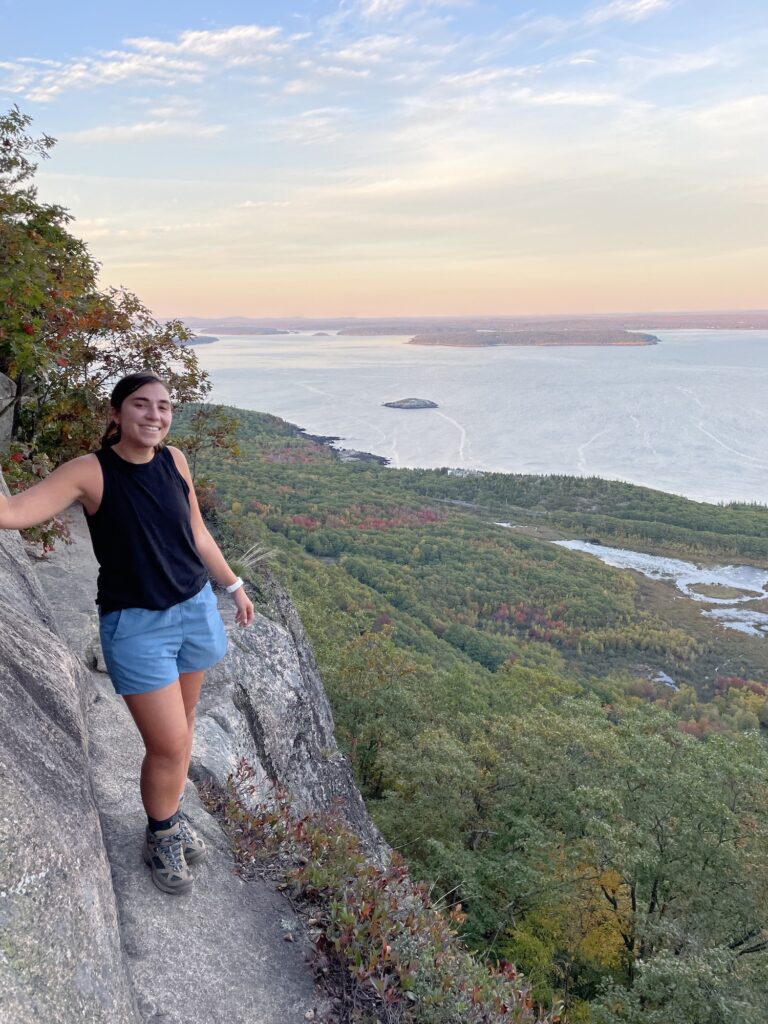 girl on narrow ledge of the precipice loop trail