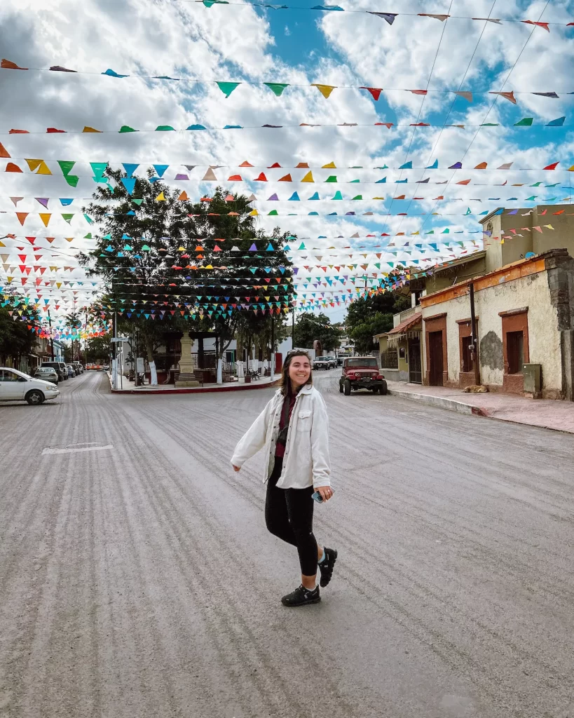 girl walking through streets of Mulege