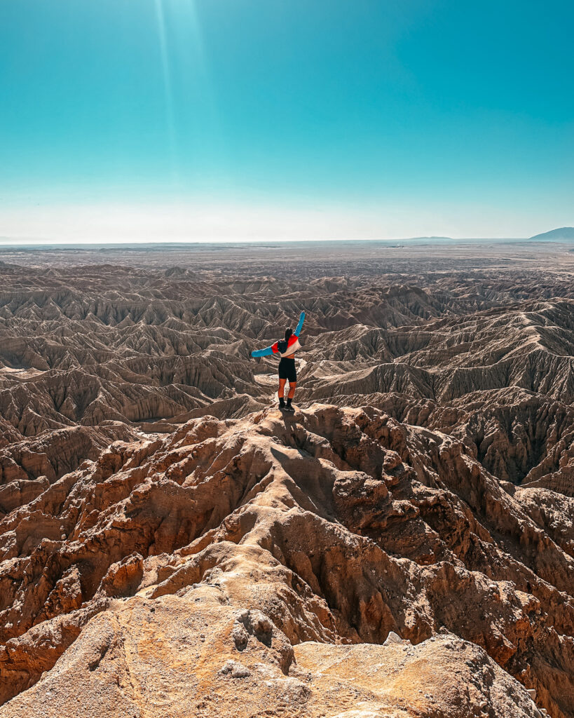 girl standing on fonts point in anza borrego