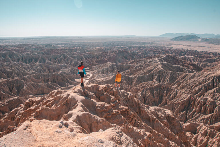 boy and girl standing on the peak of fonts point