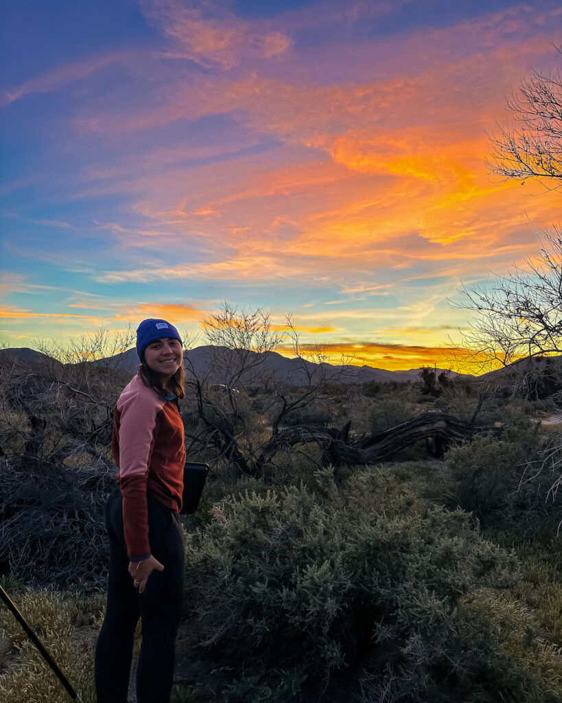 girl at vibrant sunset in yaqui well