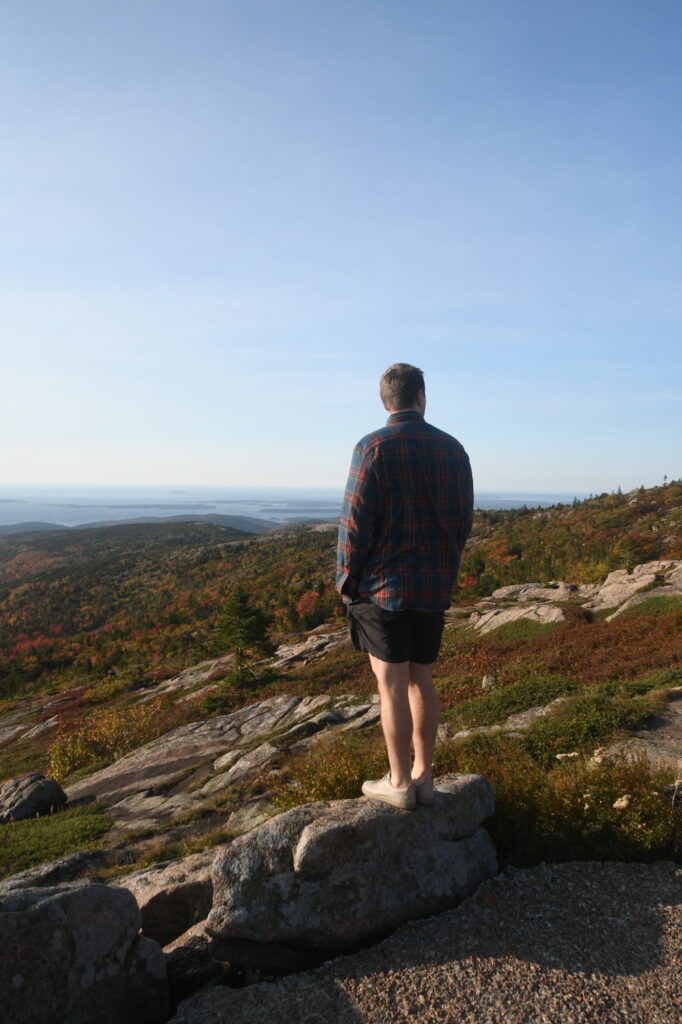 dylan on top of cadillac mountain in acadia