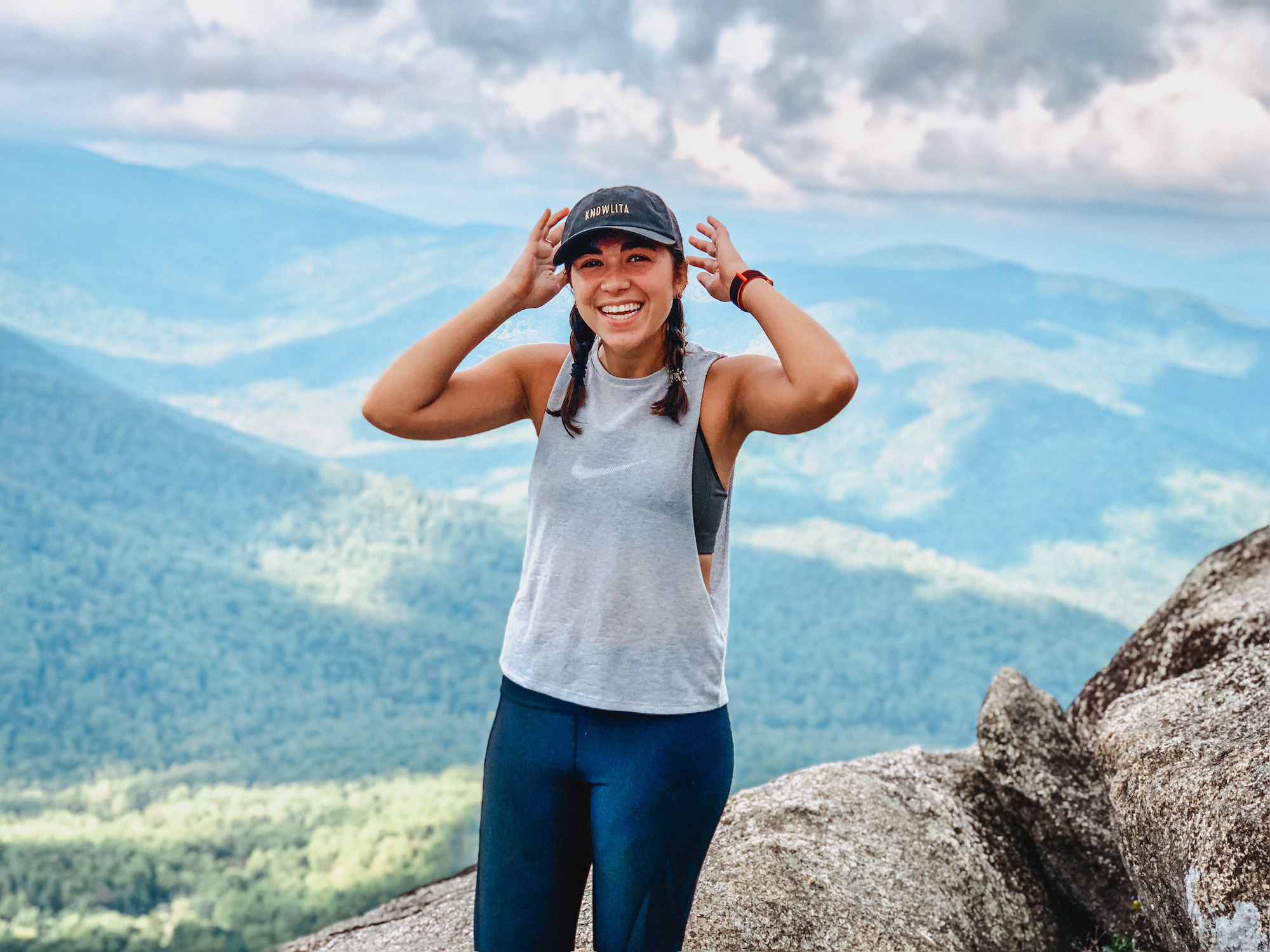 girl smiling with views off old rag in back