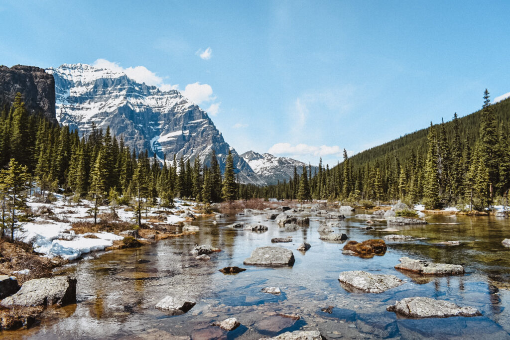 Rocky lake with mountains behind