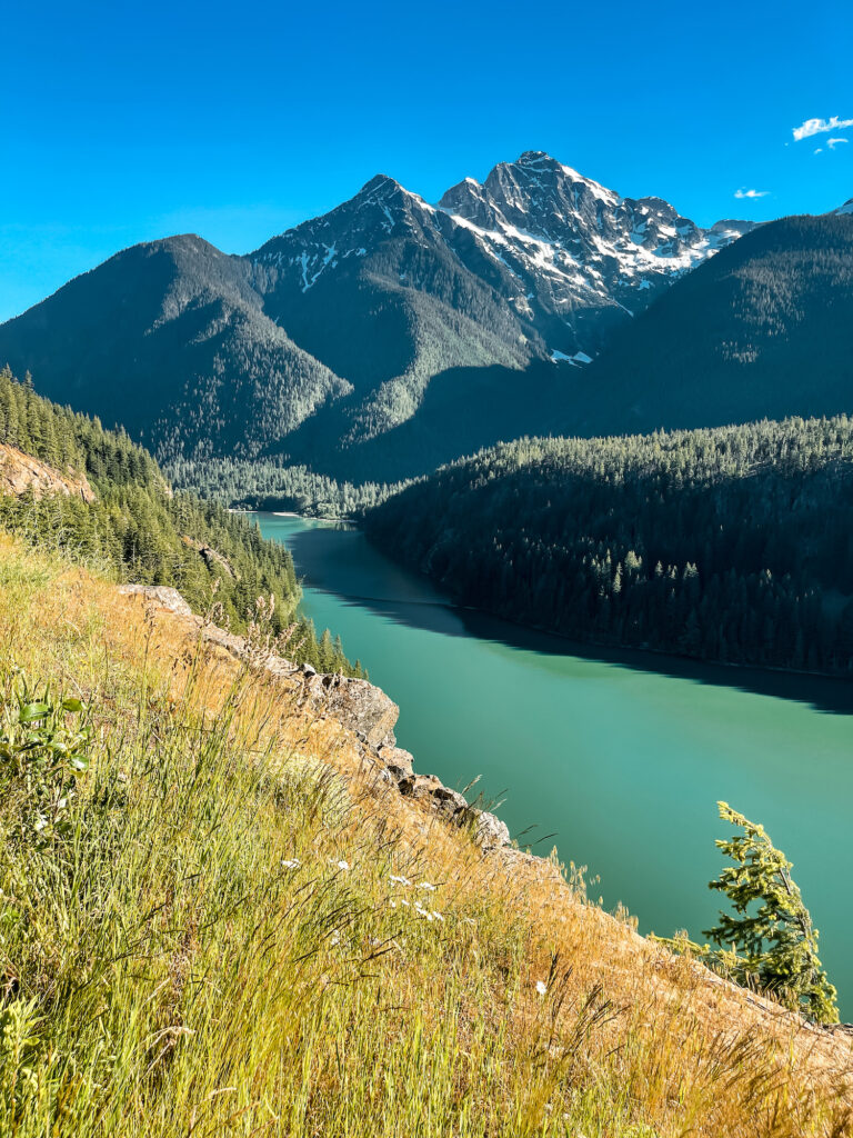 Diablo Lake with bright turquoise color and snow capped mountain