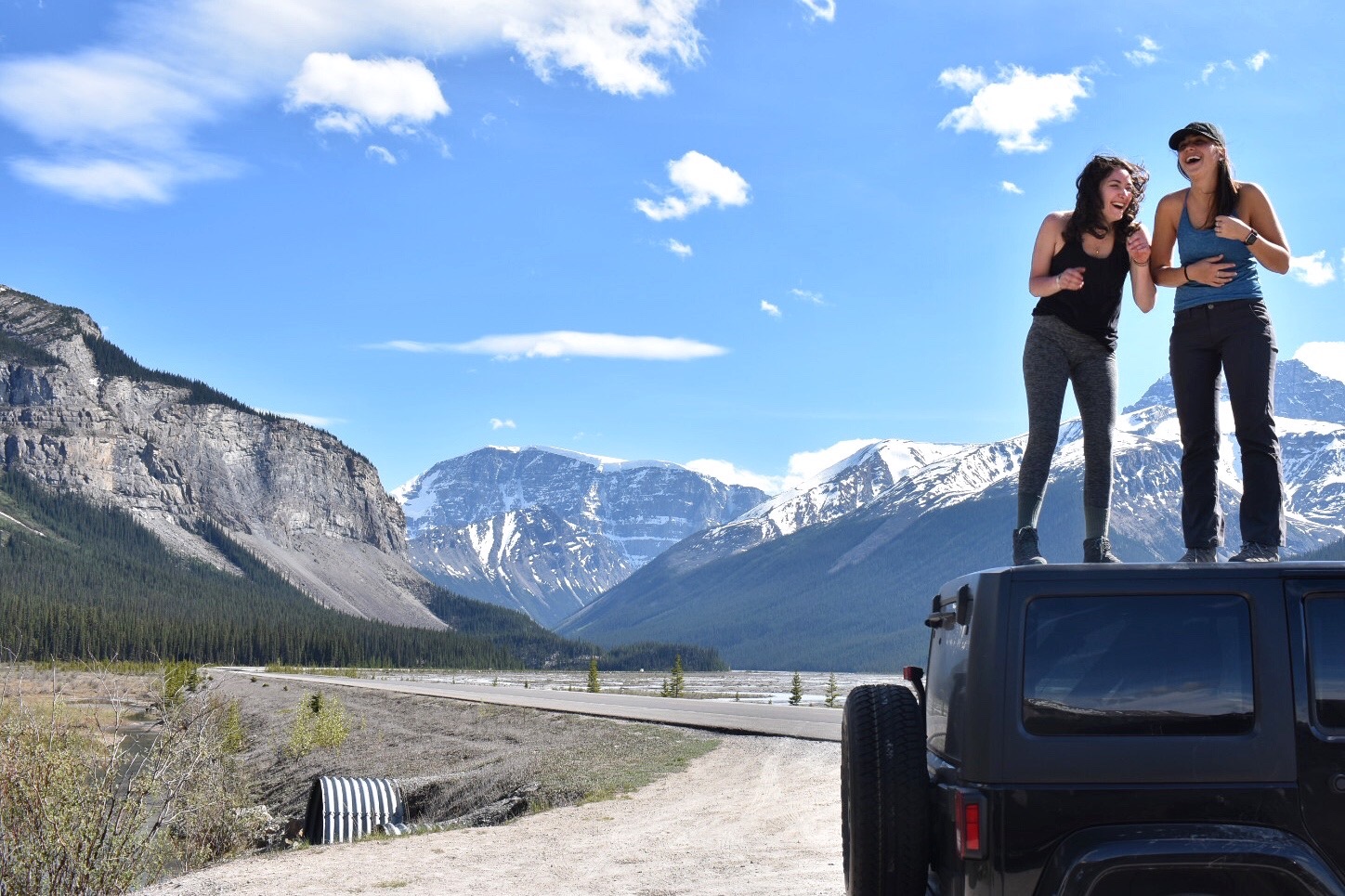 girls on a car in Icefields Parkway