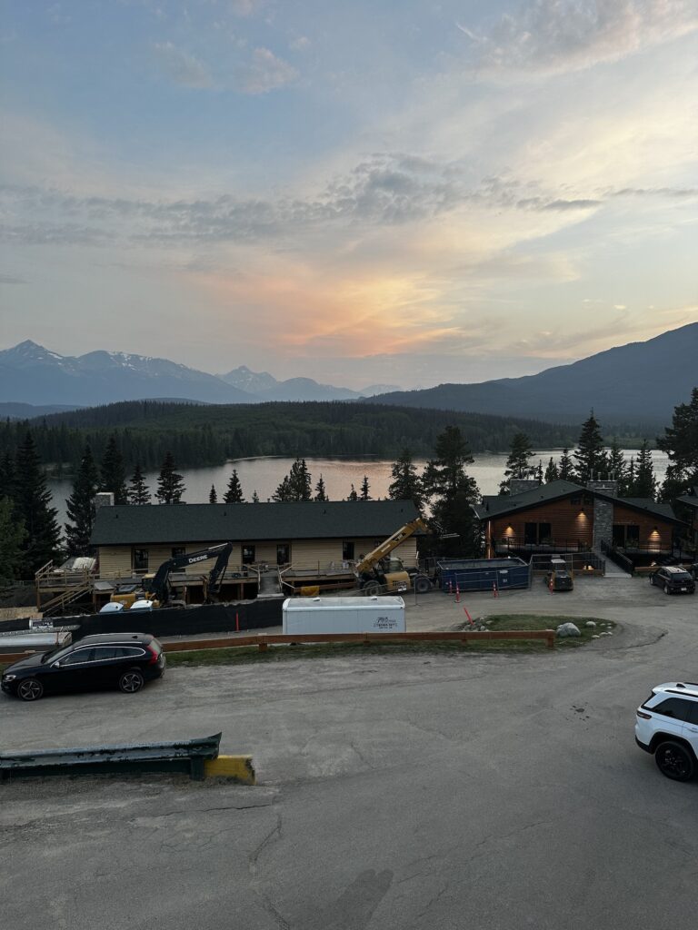 Sunset at Pyramid Lake Lodge with construction of hotel and lake behind it