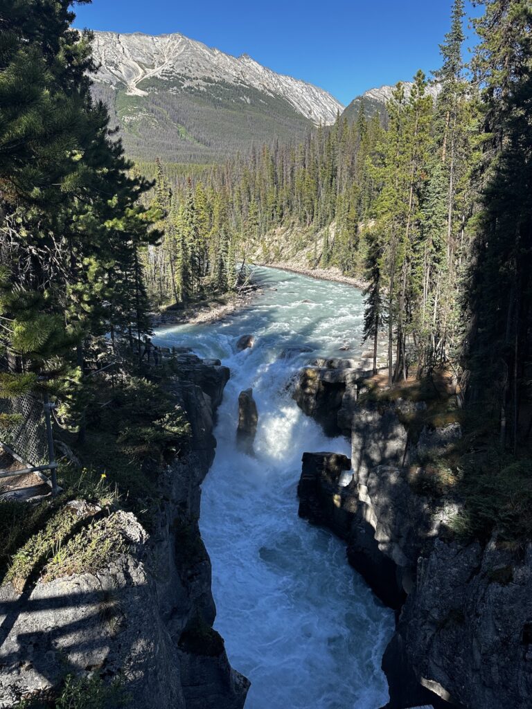 Sunwapta Falls with mountain behind it