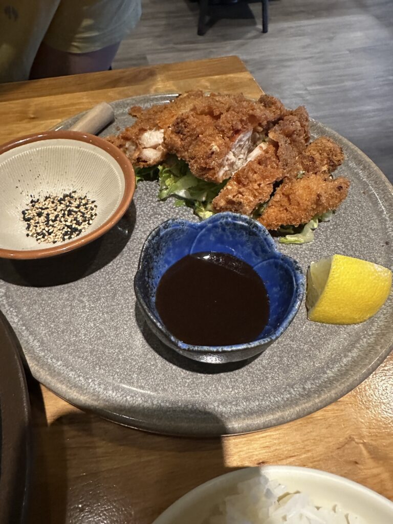 Chicken Katsu on a plate with soy sauce