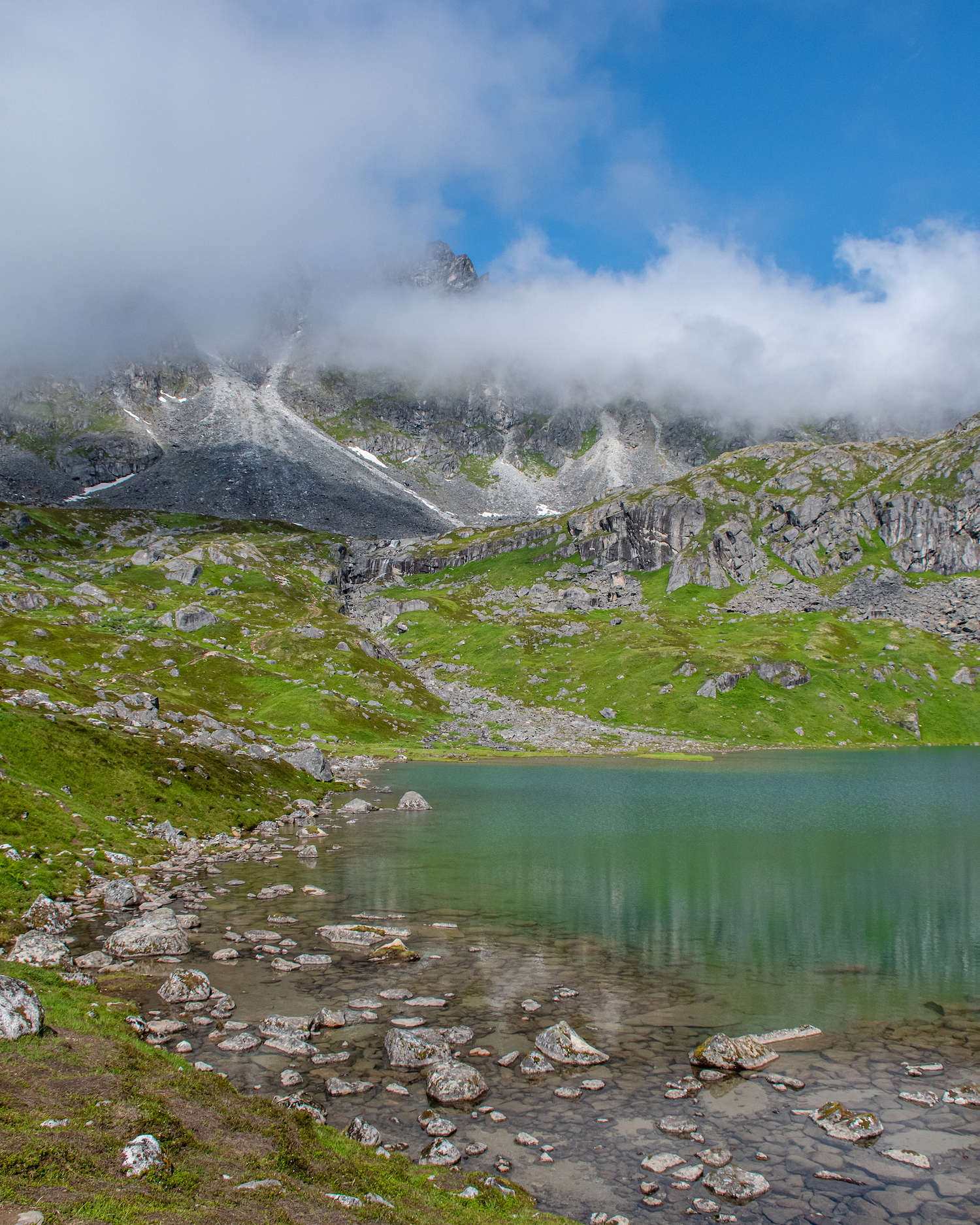 Lower Reed lake with fog covering the mountain above