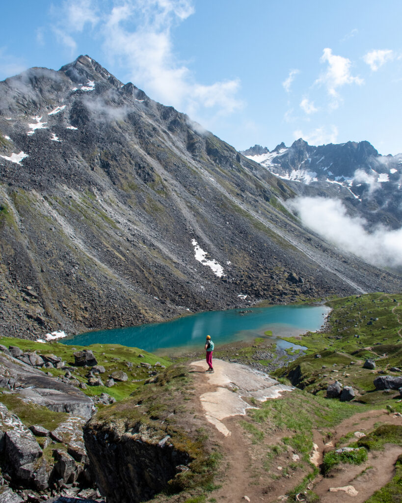 girl on a mountain above Lower Reed Lakes