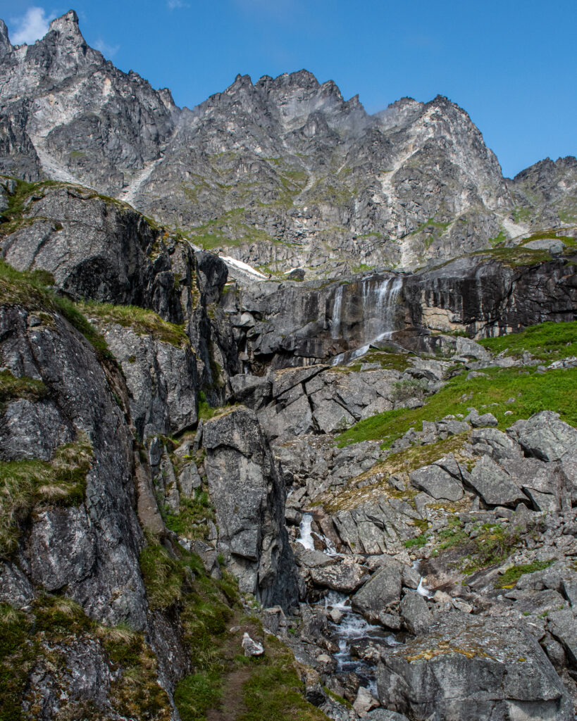 Waterfall that is above Lower Reed Lake cascading down the mountain
